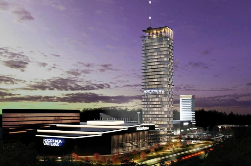Kvällsbild som visar området med multiarenan i förgrunden och höghuset med hotell bakom. Foto: Andreas Puskas / 3P Arkitektur