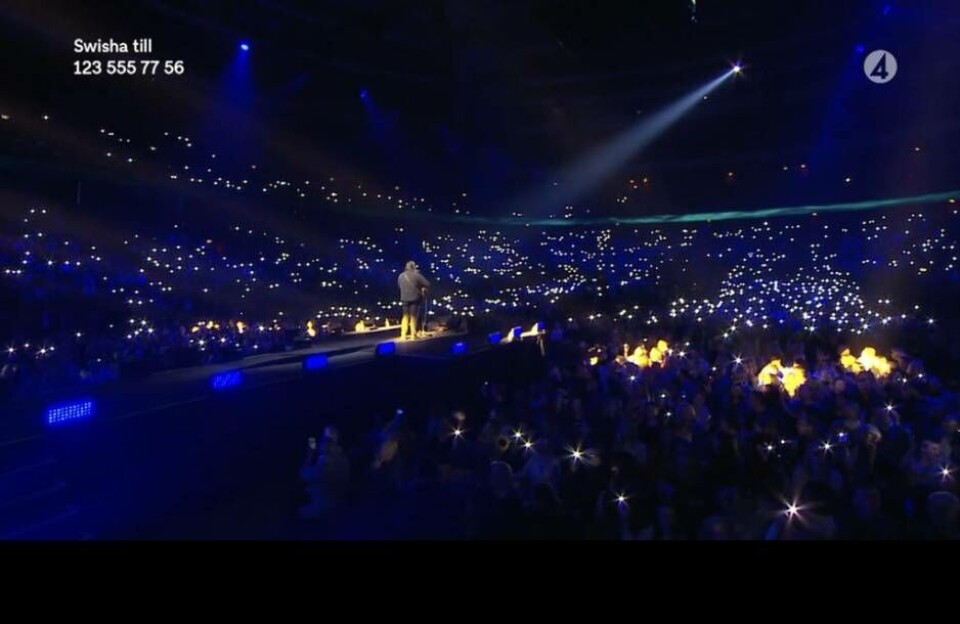 Chris Kläfford under sitt mäktiga framträdande av ”Imagine” i Avicii Arena förra helgen. Foto: TV4